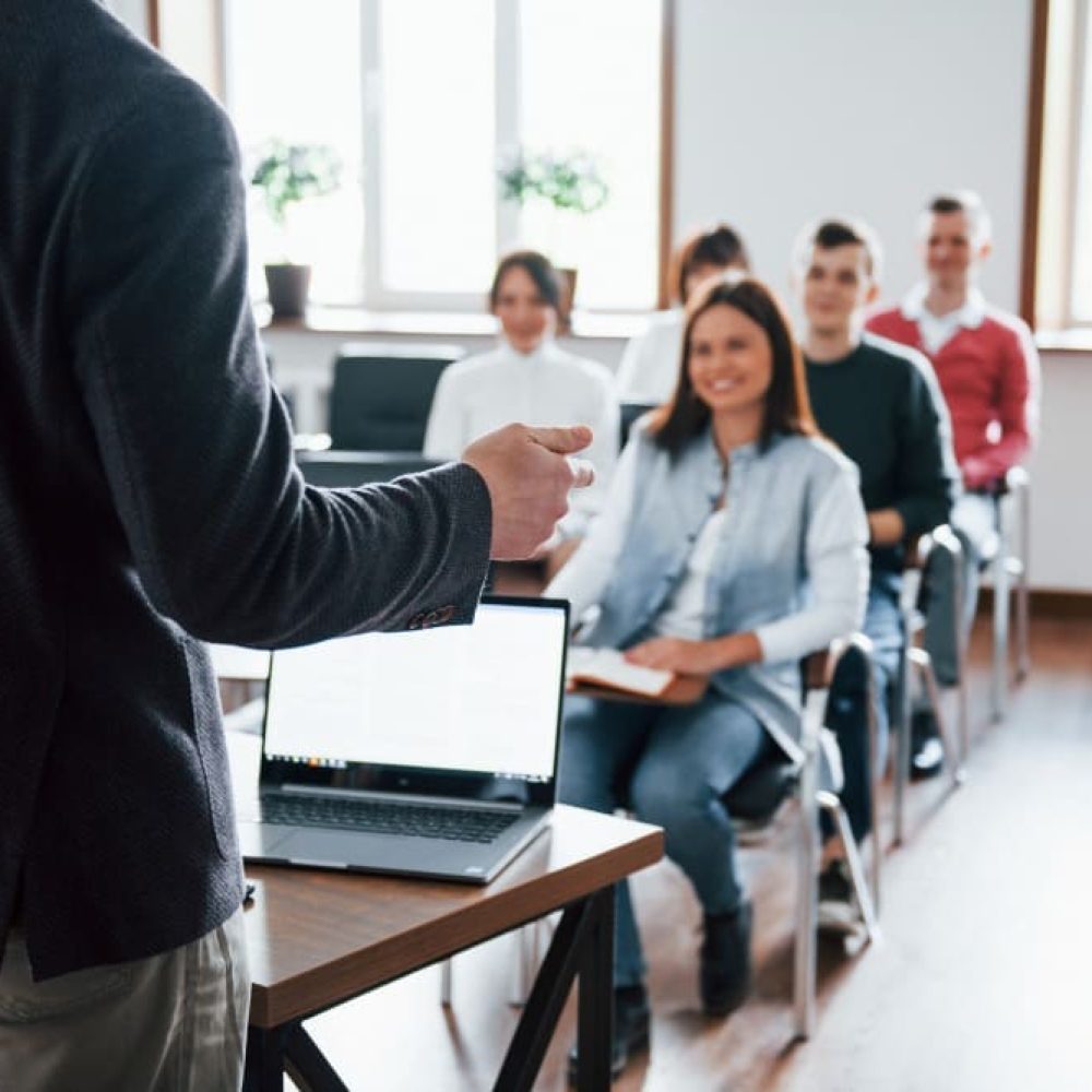 cheerful-mood-group-people-business-conference-modern-classroom-daytime_1_11zon